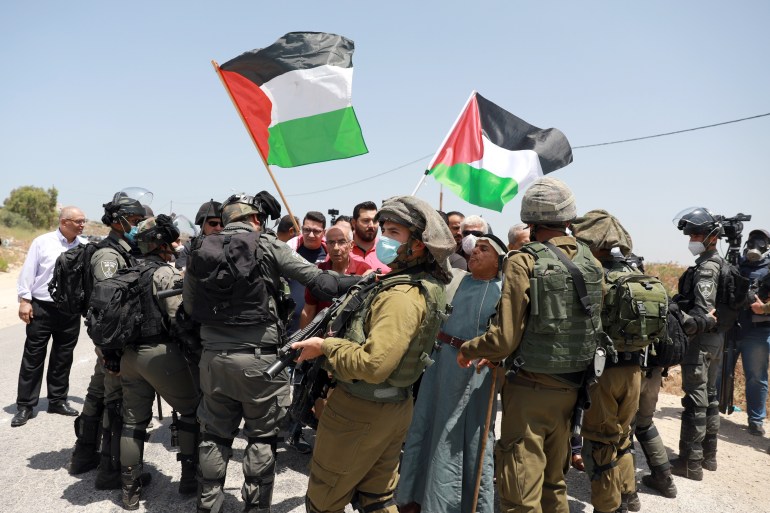 Protest in Tulkarm Protest in Tulkarm- - TULKARM, WEST BANK - JUNE 5: Israeli soldiers intervene Palestinians during a protest marking the 53rd anniversary of Naksa or setback day, near the Jabara military check point in Tulkarm, West Bank on June 5, 2020. The day also marked the displacement of tens of thousands of Palestinians from their homelands at the end of the 1967 Six-Day War, also known as the June War, resulting in the defeat of Arab armies of Egypt, Jordan, and Syria. As a result of the war, Israel took control of the Palestinian-populated West Bank, Gaza Strip, Egypt’s the Sinai Peninsula and Syria’s Golan Heights. DATE 05/06/2020