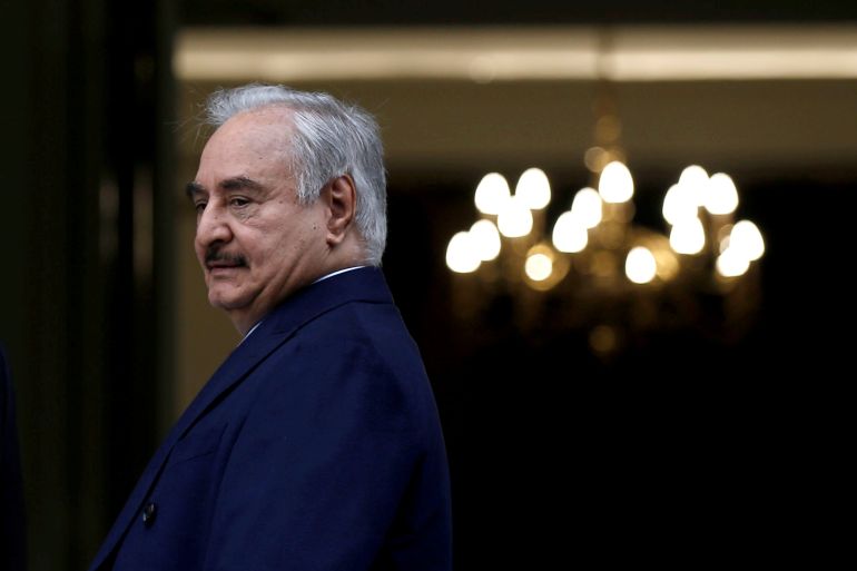 Greek Foreign Minister Nikos Dendias welcomes Libyan commander Khalifa Haftar at the Foreign Ministry in Athens