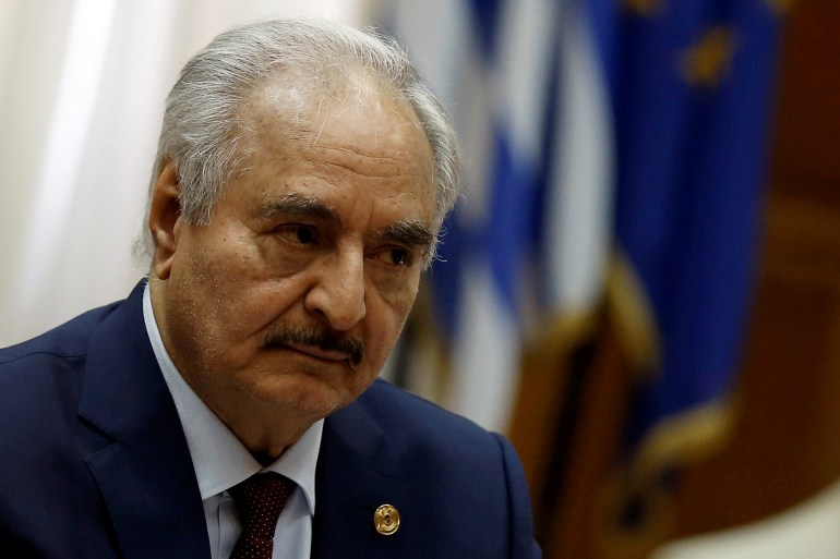 Libyan commander Khalifa Haftar meets Greek Prime Minister Kyriakos Mitsotakis (not pictured) at the Parliament in Athens (رويترز)