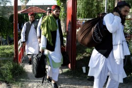 Newly freed Taliban prisoners walk in Pul-i-Charkhi prison, in Kabul, Afghanistan