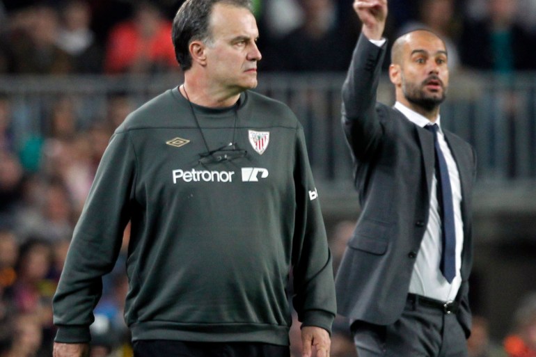 Barcelona's coach Pep Guardiola and Athletic Bilbao's coach Marcelo Bielsa react during their Spanish First division soccer league match at Camp Nou stadium in Barcelona