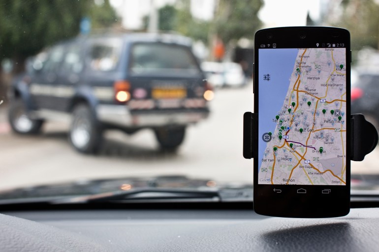 Anagog, an Israeli parking app, is seen on a smartphone in this photo illustration taken in Tel Aviv