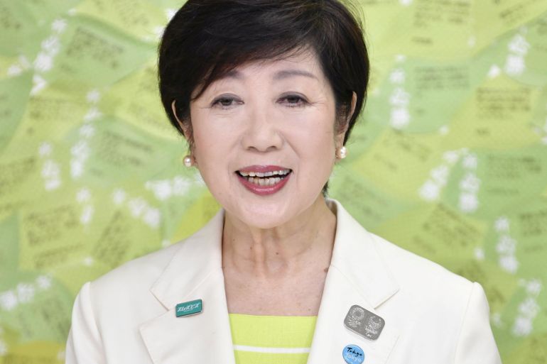 Tokyo governor Yuriko Koike speaks to the media after winning the Tokyo governor election in Tokyo