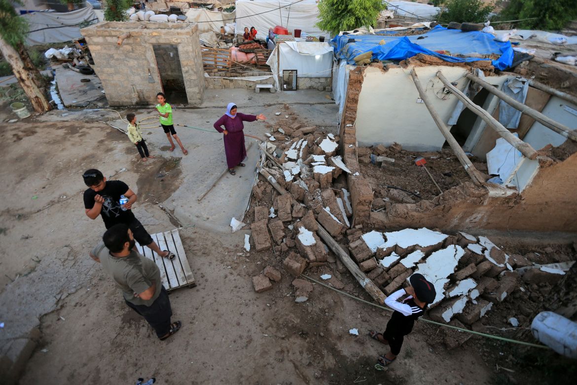 Yazidi displaced family al-Hamo leave their home in Sharya town and head back to Sinjar
