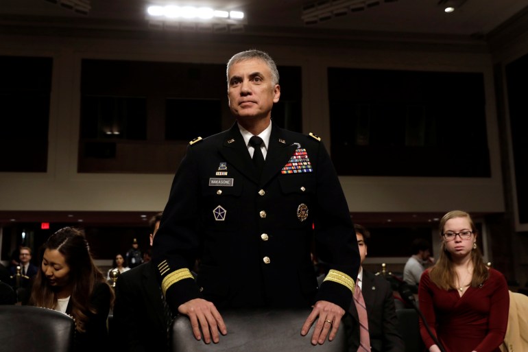 Lt. Gen. Paul M. Nakasone takes a seat before a senate Armed Services Committee hearing