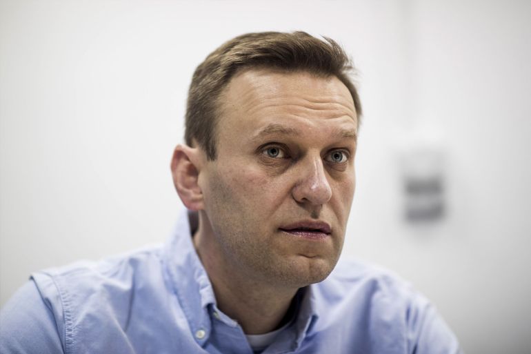 epa08616675 (FILE) - Alexei Navalny, Russian liberal opposition leader and a head of an anti-corruption foundation works in his office during president elections, Russia, 18 March 2018 (reissued 21 August 2020). A German human rights group was to...