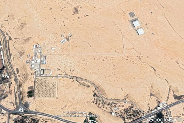 An image taken May 27 showing, top right, two square buildings that some analysts think could be a Saudi nuclear facility. It is located near the Solar Village, bottom left. Credit...Maxar Technologies/Google Eart