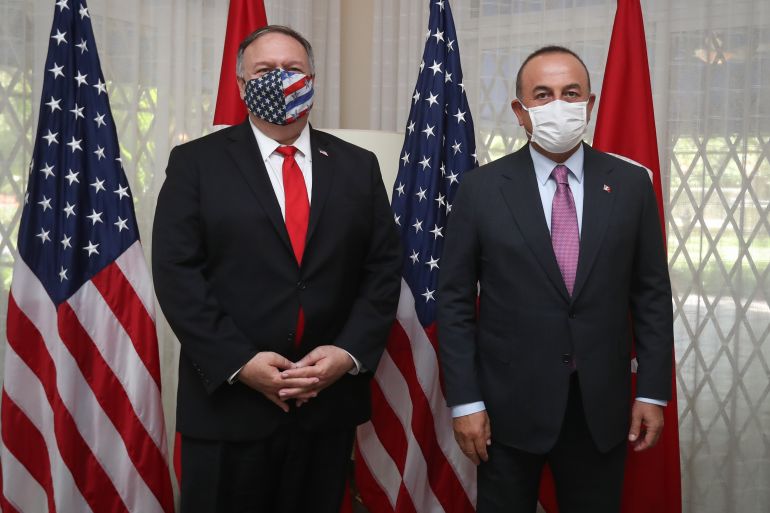 Mevlut Cavusoglu - Mike Pompeo meeting in Dominican Republic Mevlut Cavusoglu - Mike Pompeo meeting in Dominican Republic- - SANTO DOMINGO, DOMINICAN REPUBLIC - AUGUST 16: Turkish Foreign Affairs Minister Mevlut Cavusoglu (R) and the U.S. Secretary of State Mike Pompeo (L) pose for a photo ahead of their meeting in Santo Domingo, Dominican Republic on August 16, 2020.