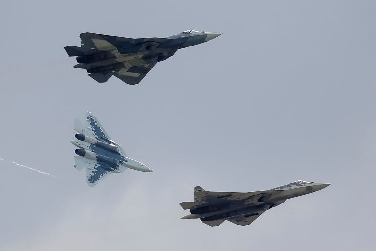 Sukhoi Su-57 fighter jets perform during a demonstration flight at the MAKS 2019 air show in Zhukovsky, outside Moscow