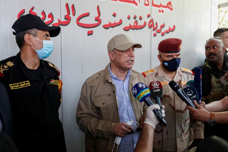 Iraqi Prime Minister Mustafa al-Kadhimi speaks to the media at Mandali border crossing between Iraq and Iran, in Mandali