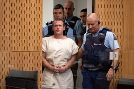 FILE PHOTO: Brenton Tarrant, charged for murder in relation to the mosque attacks, is seen in the dock during his appearance in the Christchurch District Court, New Zealand