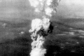 Smoke billows after an atomic bomb was dropped on Hiroshima