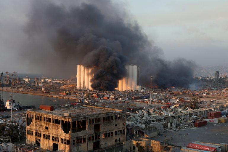 Smoke rises from the site of an explosion in Beirut's port area