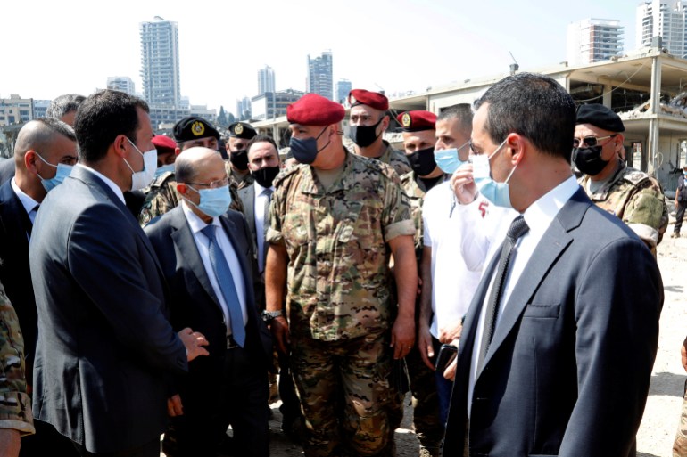 Lebanon's President Michel Aoun visits the site of Tuesday's blast in Beirut's port area