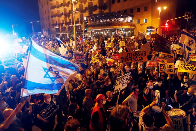 Israelis protest against Netanyahu's alleged corruption and economic hardship from COVID-19 lockdown