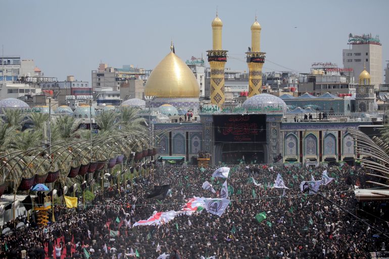 Shi'ite Muslim pilgrims gather to commemorate Ashura amid COVID-19
