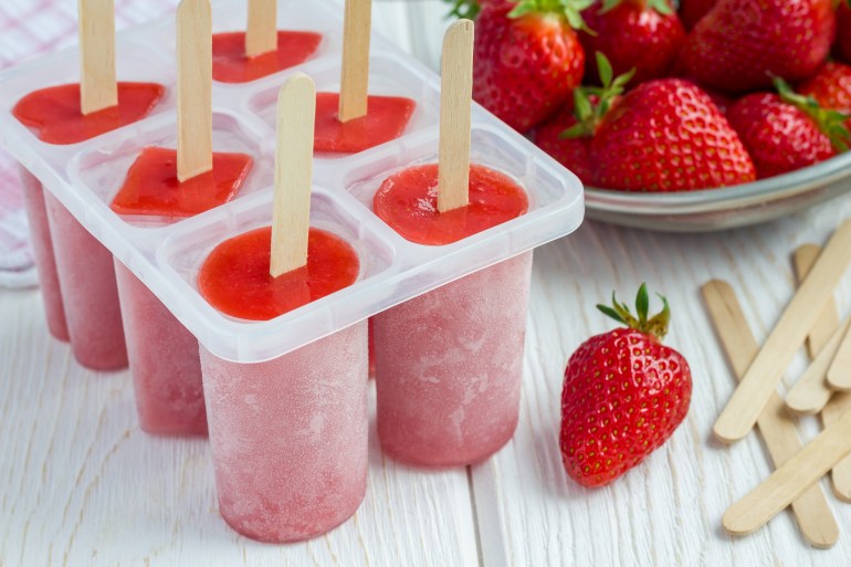 Homemade popsicles with strawberry; Shutterstock ID 413518978; Department: -
