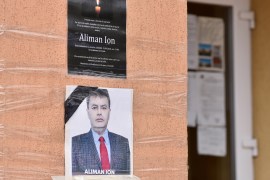 An obituary photo of former mayor Aliman Ion is taped onto the walls of the city hall in Deveselu, southern Romania, September 28, 2020. Inquam Photos/Bogdan Danescu via REUTERS ATTENTION EDITORS - THIS IMAGE WAS PROVIDED BY A THIRD PARTY. ROMANIA OUT. NO COMMERCIAL OR EDITORIAL SALES IN ROMANIA