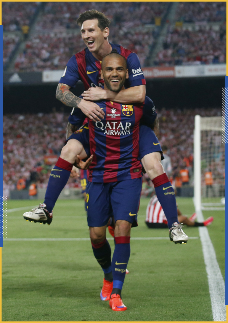 Football - Athletic Bilbao v FC Barcelona - Spanish King's Cup Final - Nou Camp - Barcelona, Spain - 30/5/15 Lionel Messi celebrates with Dani Alves after scoring the third goal for Barcelona Reuters / Albert Gea