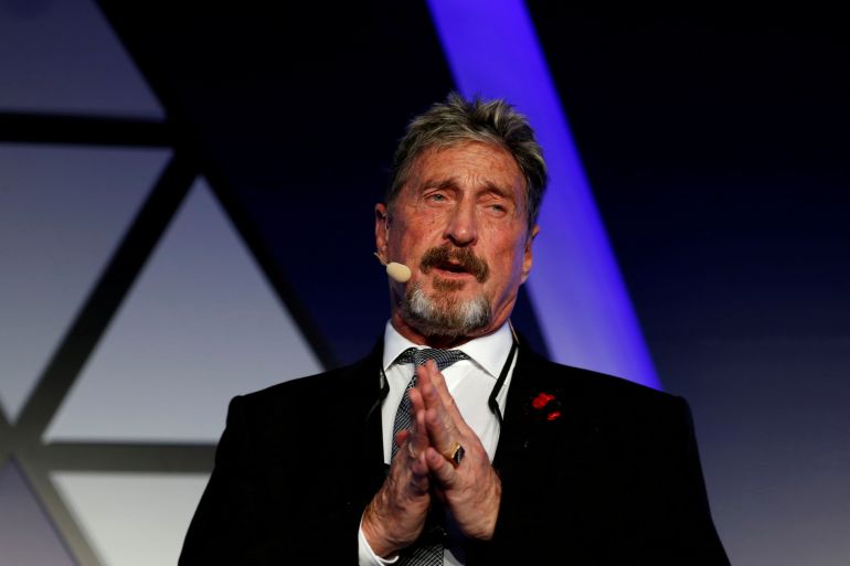 FILE PHOTO: John McAfee, co-founder of McAfee Crypto Team and CEO of Luxcore and founder of McAfee Antivirus, speaks at the Malta Blockchain Summit in St Julian's, Malta November 1, 2018. REUTERS/Darrin Zammit Lupi/File Photo