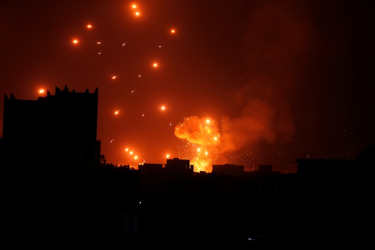 A Houthi arms depot explodes after it was hit by air strikes in Sanaa, Yemen