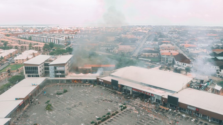 A damaged Shoprite store is seen in Lekki district of Lagos