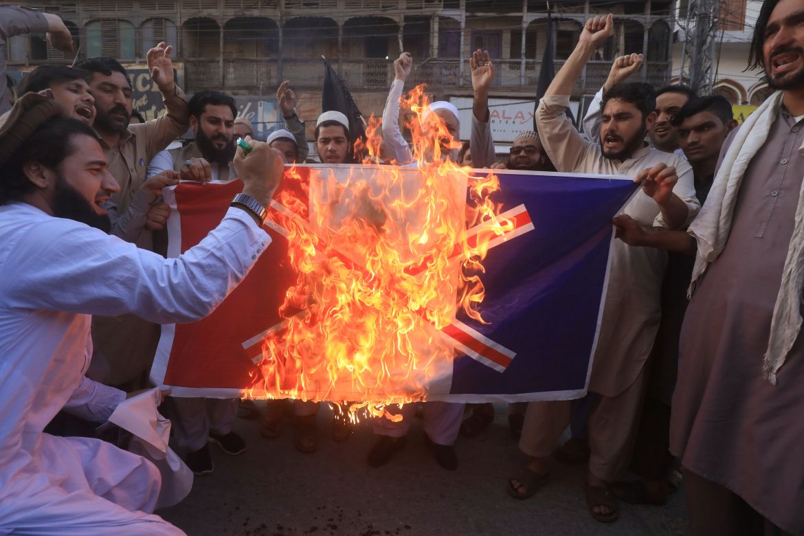 People protest against the publications of the cartoon of Prophet Mohammad in France and comments by the French President Emmanuel Macron, in Peshawar