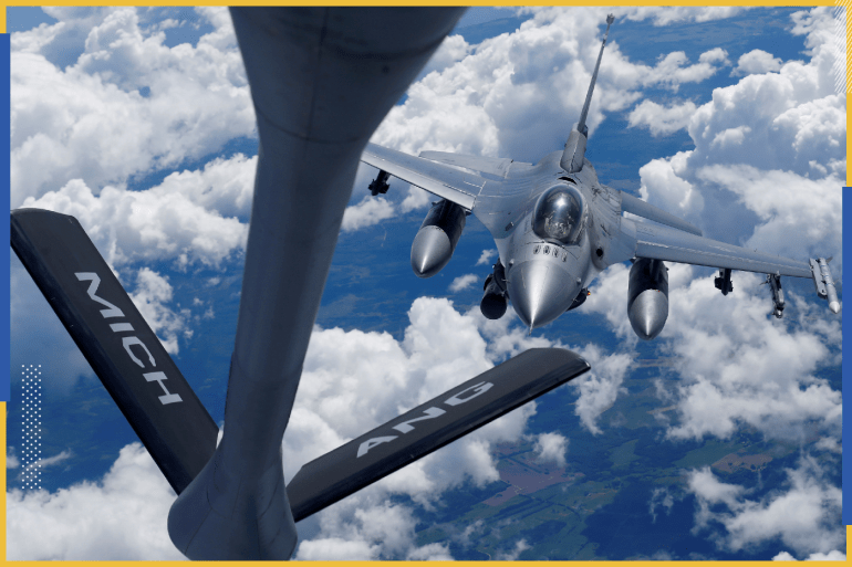 A U.S. Air Force F-16 fighter approaches a KC-135 aerial refueling aircraft during the U.S. led Saber Strike exercise in the air over Estonia June 6, 2018. REUTERS/Ints Kalnins TPX IMAGES OF THE DAY