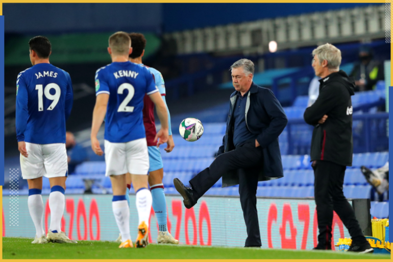LIVERPOOL, ENGLAND - SEPTEMBER 30: Carlo Ancelotti, Manager of Everton kicks the ball during the Carabao Cup fourth round match between Everton and West Ham United at Goodison Park on September 30, 2020 in Liverpool, England. Football Stadiums around United Kingdom remain empty due to the Coronavirus Pandemic as Government social distancing laws prohibit fans inside venues resulting in fixtures being played behind closed doors. (Photo by Alex Livesey/Getty Images)