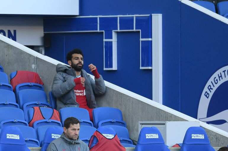 RIGHTON, ENGLAND - NOVEMBER 28: Mohamed Salah of Liverpool reacts on the bench during the Premier League match between Brighton & Hove Albion and Liverpool at American Express Community Stadium on November 28, 2020 in Brighton, England. Sporting stadiums around the UK remain under strict restrictions due to the Coronavirus Pandemic as Government social distancing laws prohibit fans inside venues resulting in games being played behind closed doors. (Photo by Mike Hewitt/Getty Images)
