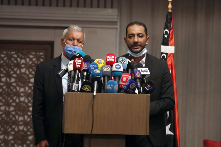epa08820497 The chairman of the Libyan political accord committee, member of the High Council of State Bachir El Haouch (L), and the member of the founding committee of the Libyan constitution Abdelmonem El Sherif (R) , hold a press conference on...