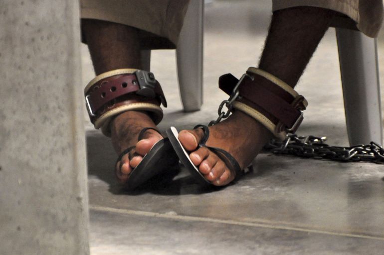 File photo of Guantanamo detainee's feet shackled to the floor as he attends a "Life Skills" class at Guantanamo Bay U.S. Naval Base