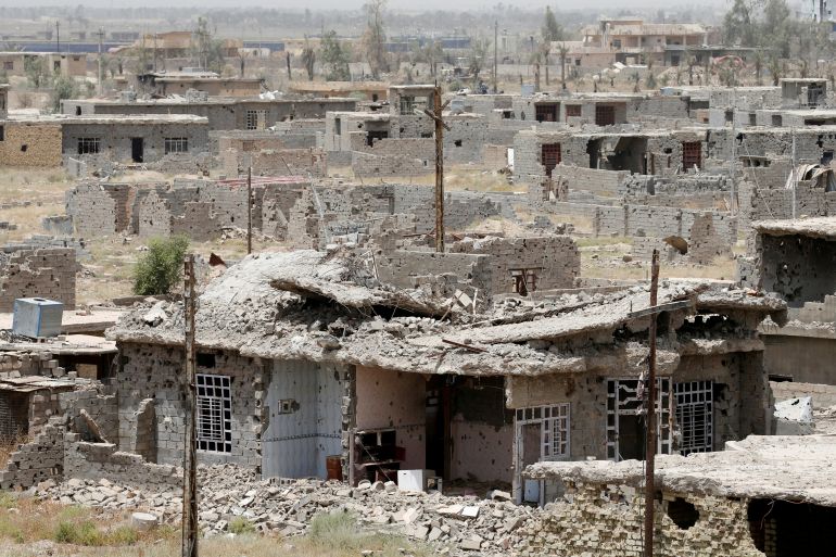 Destroyed buildings from clashes are seen on the outskirts of Falluja