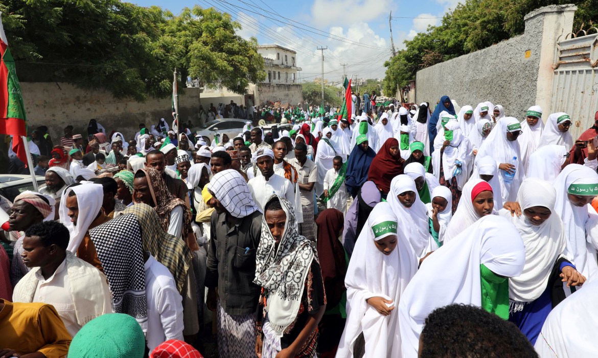 Somalis march during a protest against cartoons of Prophet Mohammad in France and French President Emmanuel Macron's comments, along the streets of Mogadishu