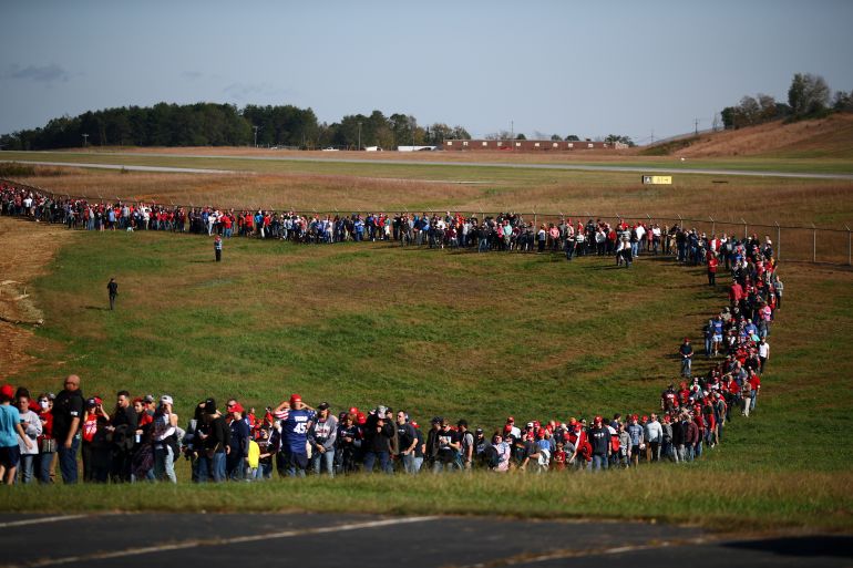 Supporters wait for the rally of U.S. President Donald Trump at Hickory Regional Airport in Hickory, North Carolina