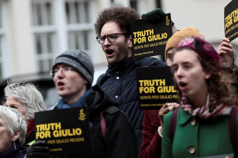Demonstrators from Amnesty International hold placards outside the Egyptian embassy in support of Giulio Regeni, who was found murdered in Cairo two years ago, in London, Britain, February 2, 2018. REUTERS/Simon Dawson