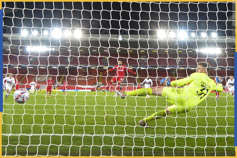 epa08779260 Mohamed Salah (C) of Liverpool scores from the penalty spot the 2-1 lead against goalkepeer Mikkel Andersen (R) of Midtjylland during the UEFA Champions League group D match between Liverpool and Midtjylland in Liverpool, Britain, 27...