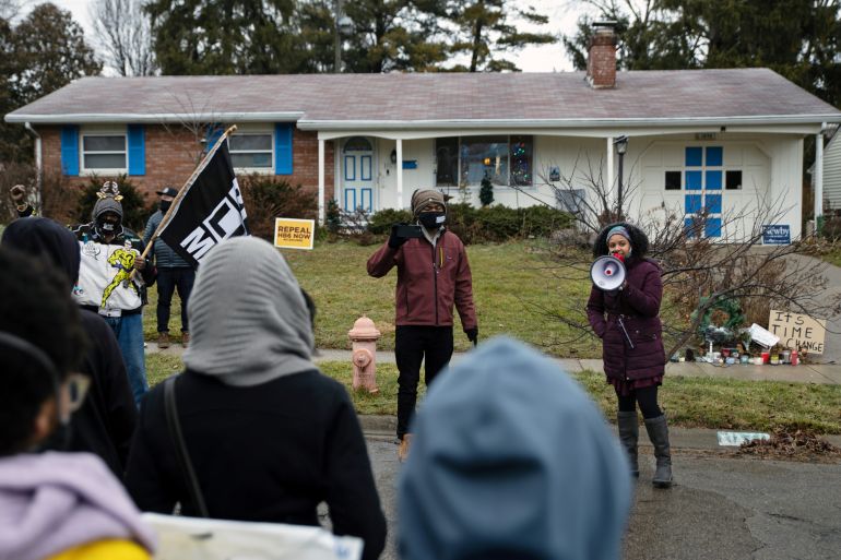 Protesters gather after the killing of Andre Maurice Hill in Columbus, Ohio