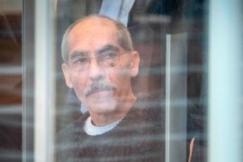 Anwar Raslan arriving at court to face trial in Germany. Photograph: AFP/Getty Images