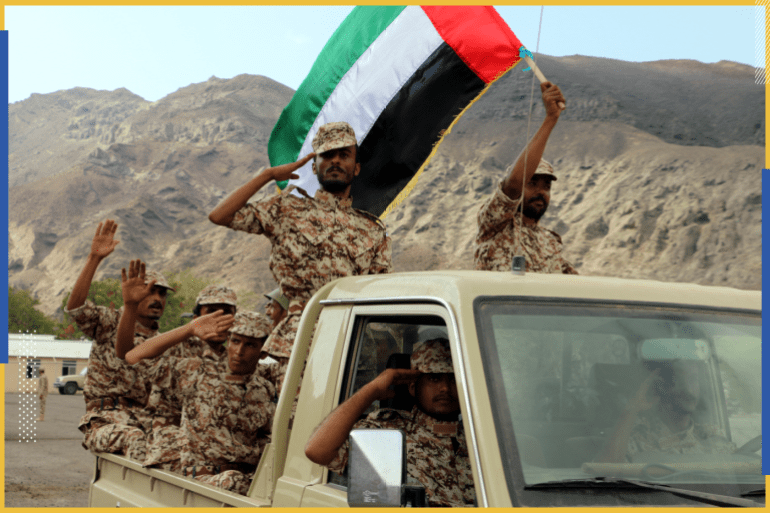 epa07704094 An Emirati forces-trained recruit of Yemeni army waves a UAE flag during combat training in the southern port city of Yemen, 29 September 2017 (Issued on 08 July 2019). According to reports, the United Arab Emirates (UAE) on 08 July...