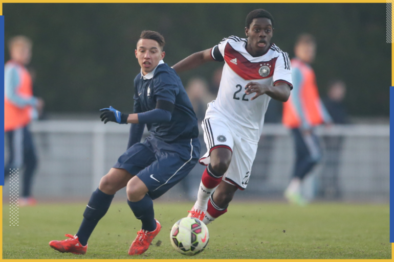 SARRE-UNION, France - MARCH 27: Malcolm Badu of Germany challenges Ismael Bennacer of France during the friendly match between U18 France and U18 Germany at Omnisports Stade Stadium on March 27, 2015 in Sarre-Union, France. (Photo by Andreas Schlichter/Bongarts/Getty Images)