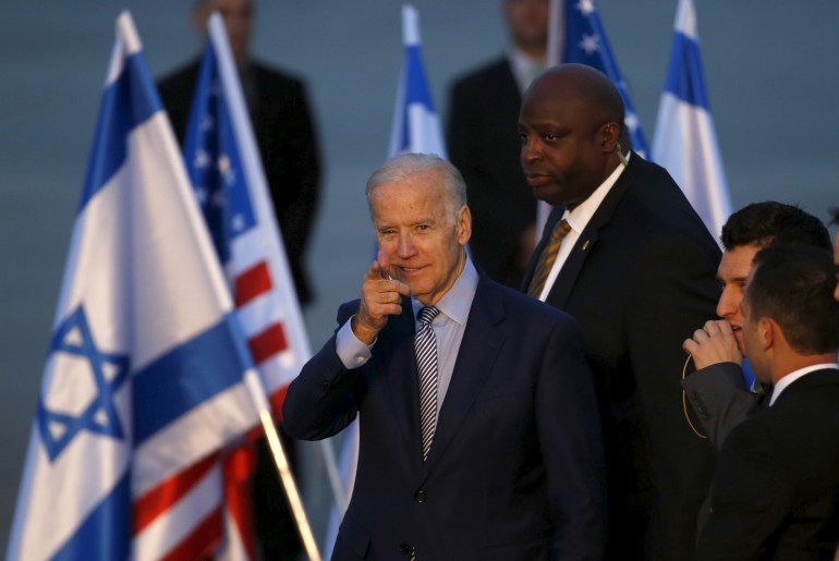 U.S. Vice President Biden gestures after disembarking from a plane upon landing at Ben Gurion International Airport in Lod, near Tel Aviv, Israel