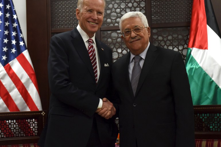 U.S. Vice-President Joe Biden shakes hands with Palestinian President Mahmoud Abbas in the West Bank city of Ramallah