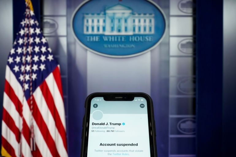 A photo illustration shows the suspended Twitter account of U.S. President Donald Trump on a smartphone at the White House briefing room in Washington A photo illustration shows the suspended Twitter account of U.S. President Donald Trump on a smartphone at the White House briefing room in Washington, U.S., January 8, 2021. REUTERS/Joshua Roberts/Illustration DATE 09/01/2021 SIZE 5902 x 3935 SOURCE REUTERS/Joshua Roberts