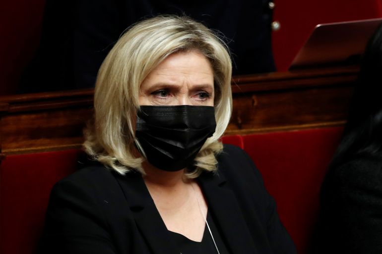 The questions to the government session at the National Assembly in Paris Marine Le Pen, member of parliament and leader of French far-right National Rally (Rassemblement National) party, wearing a protective face mask, attends the questions to the government session at the National Assembly in Paris amid the coronavirus disease (COVID-19) in France, January 12, 2021. REUTERS/Gonzalo Fuentes DATE 12/01/2021 SIZE 2525 x 1688 SOURCE REUTERS/Gonzalo Fuentes