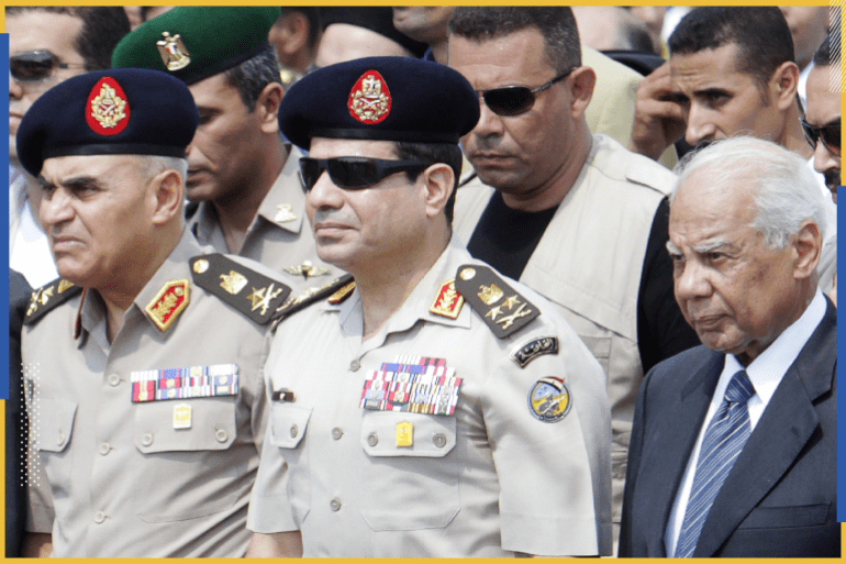 Army Chief General Abdel Fattah al-Sisi (C) stands next to interim Prime Minister Hazem el-Beblawi (R) during the military funeral service of Police General Nabil Farag, who was killed on Thursday in Kerdasa, at Al-Rashdan Mosque in Cairo's Nasr City district September 20, 2013. Egyptian security forces were hunting for supporters of deposed President Mohamed Mursi of the Muslim Brotherhood on Friday after retaking control of a town near Cairo in a crackdown on Islamists. On Thursday, army and police forces stormed Kerdasa where Islamist sympathies run deep and hostility to the authorities has grown since the army overthrew and imprisoned Mursi on July 3. REUTERS/Mohamed Abd El Ghany (EGYPT - Tags: POLITICS CIVIL UNREST MILITARY)