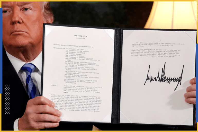 U.S. President Donald Trump holds up a proclamation declaring his intention to withdraw from the JCPOA Iran nuclear agreement after signing it in the Diplomatic Room at the White House in Washington, U.S. May 8, 2018. REUTERS/Jonathan Ernst TPX IMAGES OF THE DAY