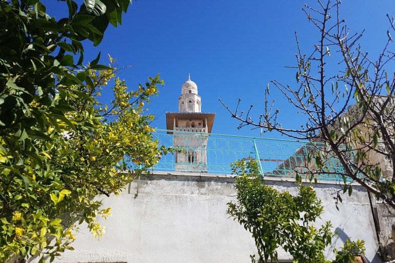 6-أسيل جندي، مئذنة باب الغوانمة في المسجد الأقصى كما تظهر من بستان وفاء البخاري(الجزيرة نت)