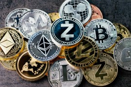 Crypto currency background with various of shiny silver and golden physical cryptocurrencies symbol coins, Bitcoin, Ethereum, Litecoin, zcash, ripple.; Shutterstock ID 1434643079; Department: -
