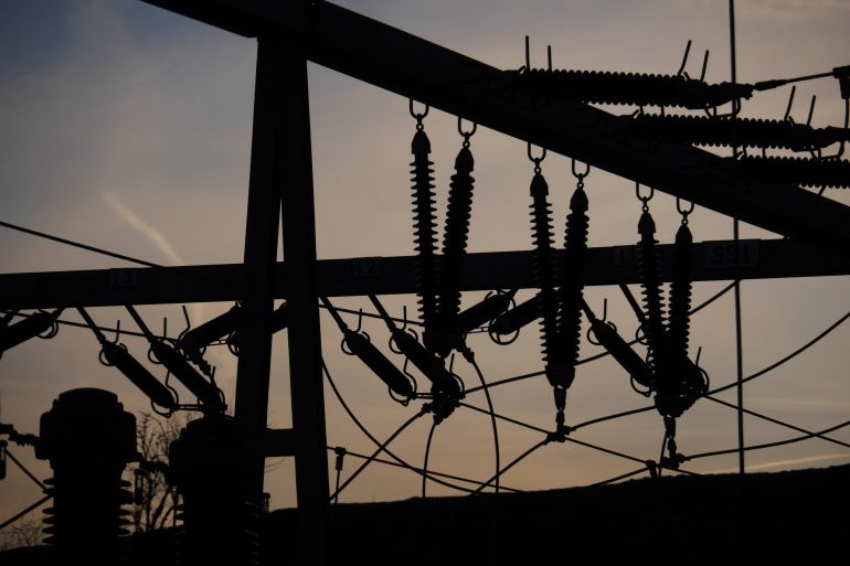 Electrical power grid in silhouette; Shutterstock ID 180605156; Department: -
